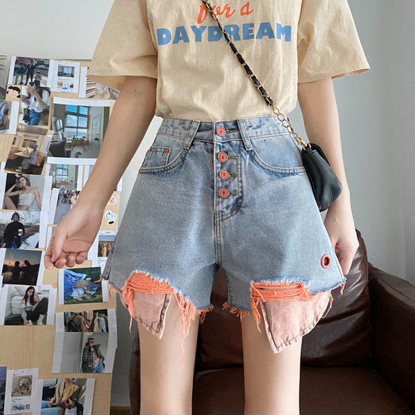 Rebenenud motiivide ja taskutega vabaaja naiste teksapüksid