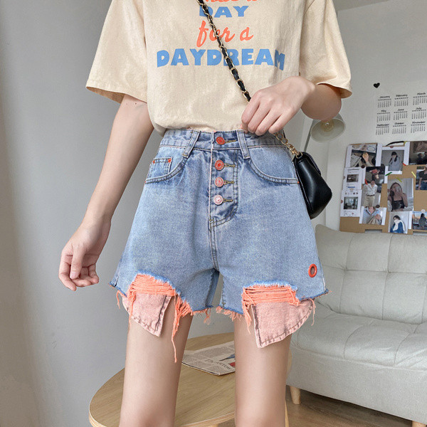 Rebenenud motiivide ja taskutega vabaaja naiste teksapüksid