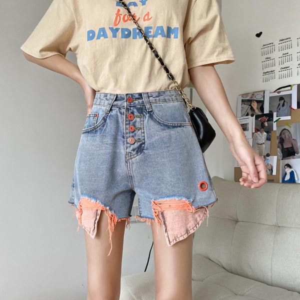 Rebenenud motiivide ja taskutega vabaaja naiste teksapüksid