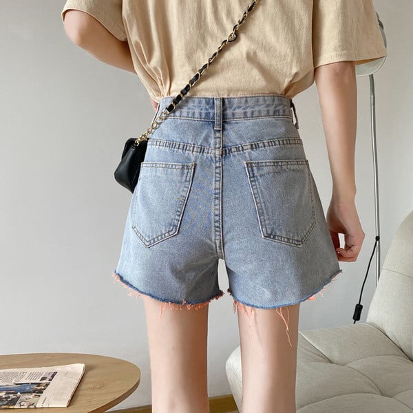 Rebenenud motiivide ja taskutega vabaaja naiste teksapüksid