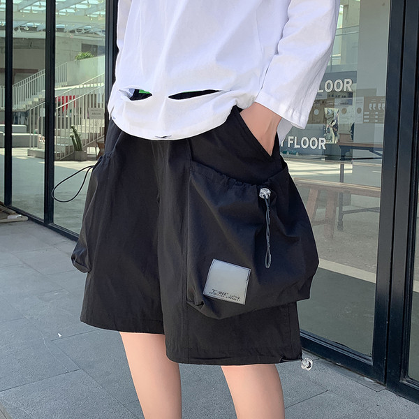 Laiad taskusidemetega cargo-püksid