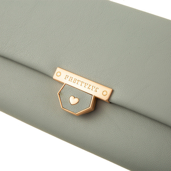 Moteriška odinė piniginė su metalo apdaila