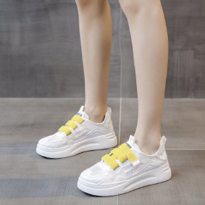 Modern női tornacipő színes nyakkendőkkel