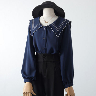 Moderns sieviešu krekls ar apaļu kakla izgriezumu