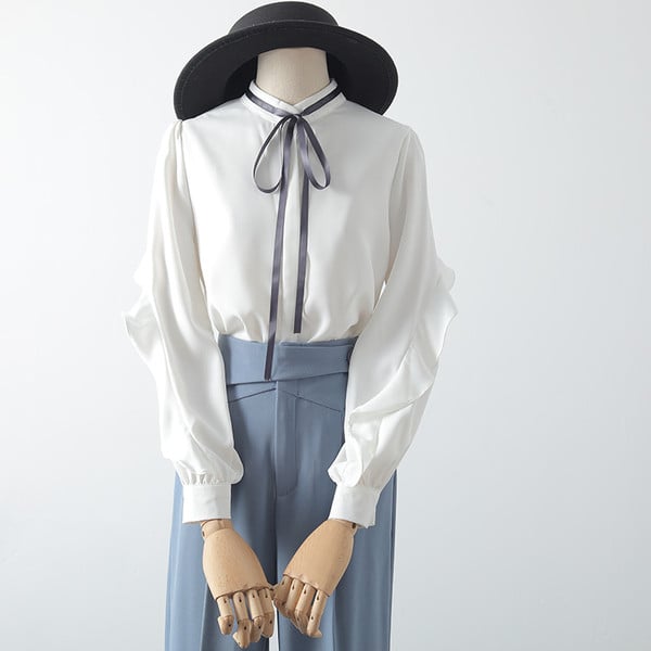 Moodne madala krae ja paeltega naiste särk