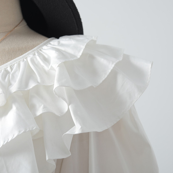 Jauna modeļa sieviešu krekls ar apaļu kakla izgriezumu un lotosa piedurknēm