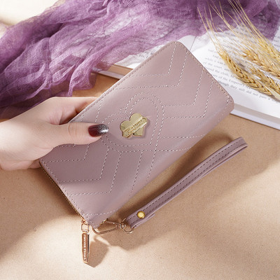 Sieviešu maks ar rāvējslēdzēju un metāla sirdi