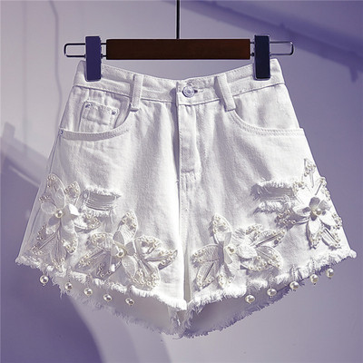 Moodsad kõrge vöökoha ja 3D-elemendiga naiste teksapüksid