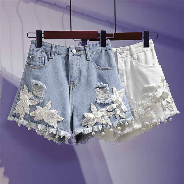 Moodsad kõrge vöökoha ja 3D-elemendiga naiste teksapüksid