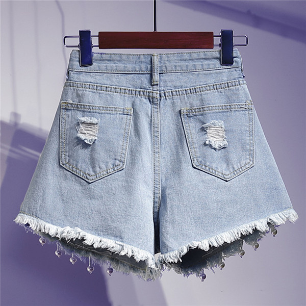 Moodsad kõrge vöökoha ja 3D-elemendiga naiste teksapüksid