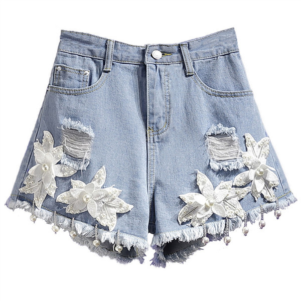 Moodsad kõrge vöökoha ja 3D-elemendiga naiste teksapüksid