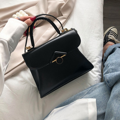 Eko bőrből készült alkalmi női táska hosszú és rövid füllel, fekete színben