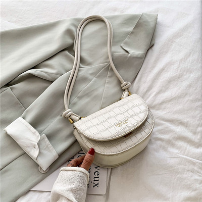 Naiste vabaaja nahast kott pika sangaga mitmes värvitoonis