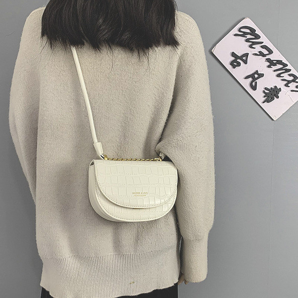 Naiste vabaaja nahast kott pika sangaga mitmes värvitoonis