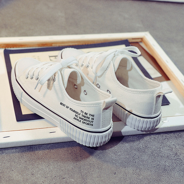 Casual γυναικεία αθλητικά παπούτσια με κορδόνια και επιγραφή
