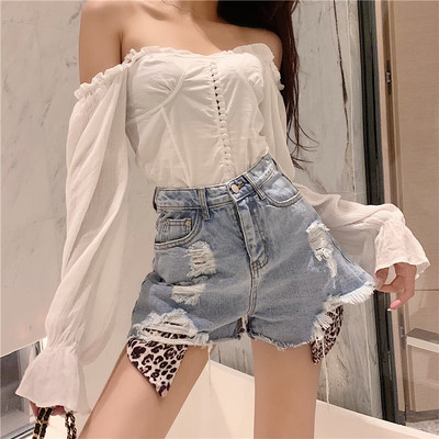 Stiilsed loomamustri ja rebenenud motiividega naiste lühikesed püksid