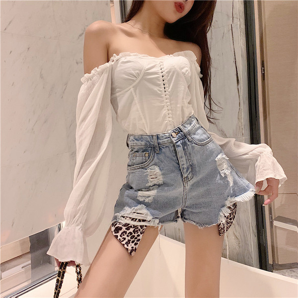 Stiilsed loomamustri ja rebenenud motiividega naiste lühikesed püksid