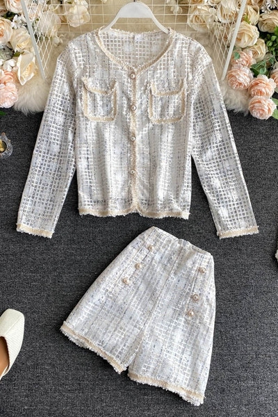 Elegáns női szett két részből - ingből és nadrágból