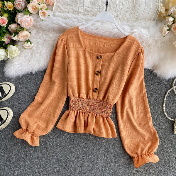 Naiste vabaaja särk nööpide ja elastse vöökohaga