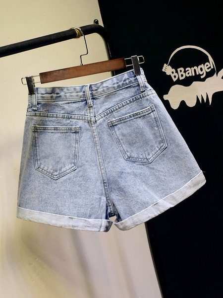 Széles farmer rövidnadrág magas derékkal és gyöngyökkel