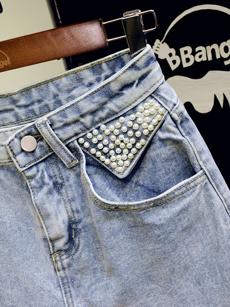 Széles farmer rövidnadrág magas derékkal és gyöngyökkel