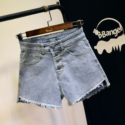 Kõrge vöökohaga teksapüksid ja nööbid