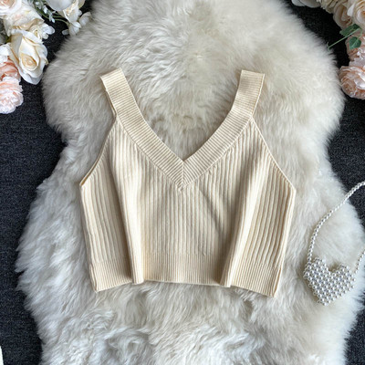 Κοντή γυναικεία μπλούζα από κοτλέ φούτερ με ντεκολτέ