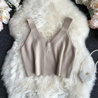 Κοντή γυναικεία μπλούζα από κοτλέ φούτερ με ντεκολτέ