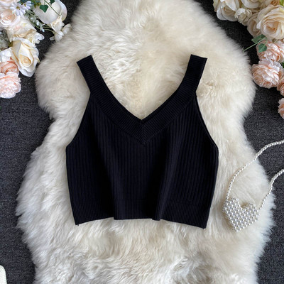 Κοντή γυναικεία μπλούζα από κοτλέ φούτερ με ντεκολτέ