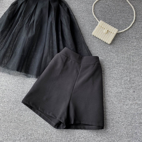 Moodne naiste komplekt tüllsärgist ja kõrge vöökohaga pükstest