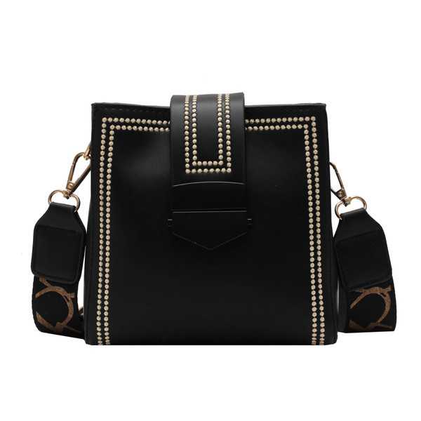 Κομψή γυναικεία τσάντα από οικολογικό δέρμα με υφασμάτινη λαβή σε διάφορα χρώματα