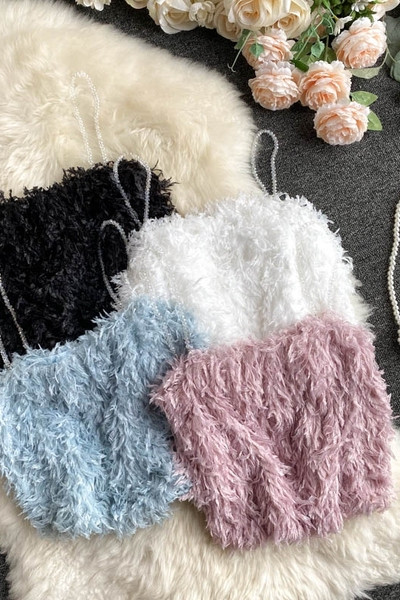 Μοντέρνα γυναικεία μπλούζα με  πούπουλα