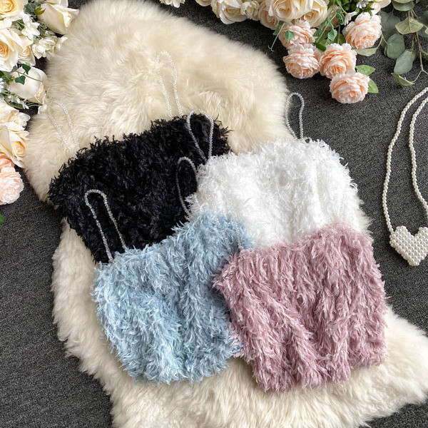 Μοντέρνα γυναικεία μπλούζα με  πούπουλα