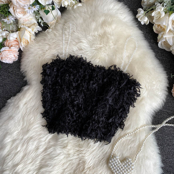 Μοντέρνα γυναικεία μπλούζα με  πούπουλα