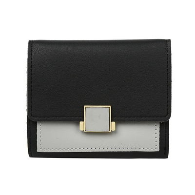 Κομψό γυναικείο πορτοφόλι με μεταλλικό στοιχείο