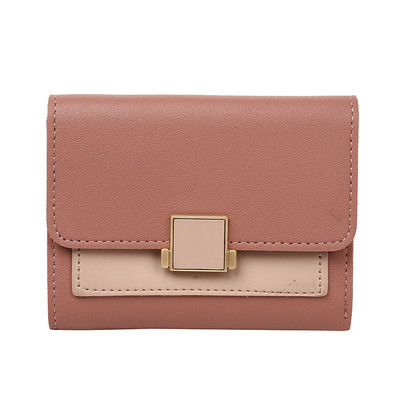 Κομψό γυναικείο πορτοφόλι με μεταλλικό στοιχείο