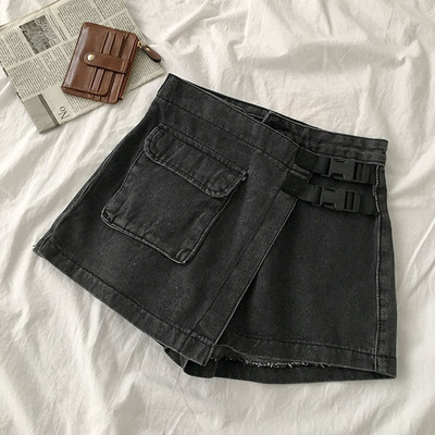 Pašreizējie džinsa šorti ar kabatu