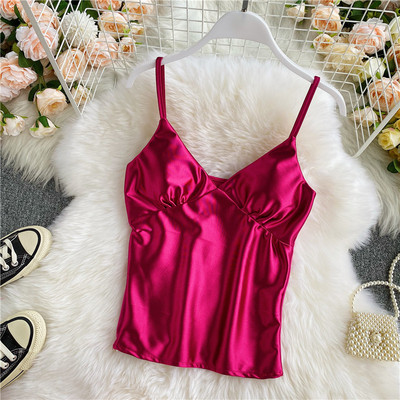 Modern női felső vékony pántokkal és spitz nyakkivágással