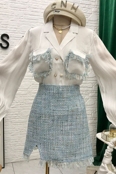 Stiilne naiste komplekt, mis sisaldab pikkade varrukatega särki ja seelikut