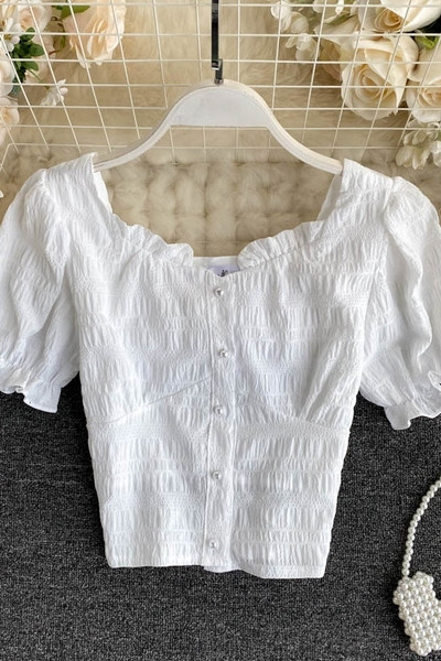 Valge naiste särk lühikeste varrukate ja nööpidega