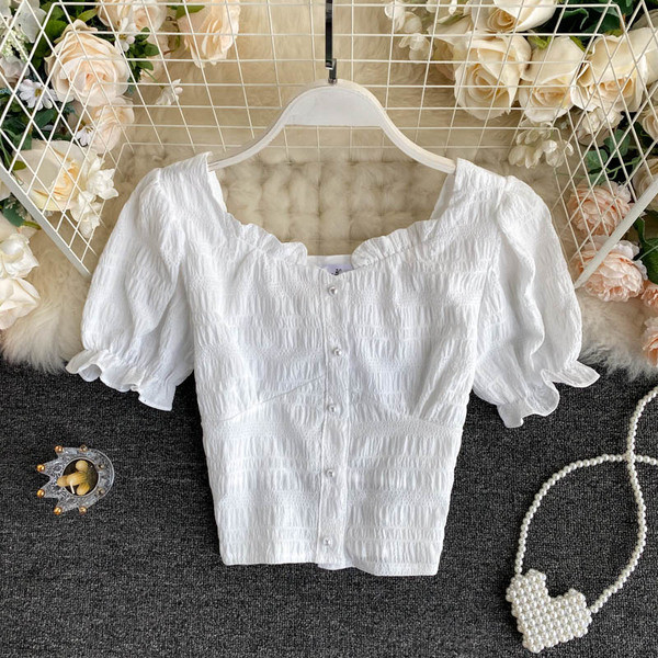 Valge naiste särk lühikeste varrukate ja nööpidega