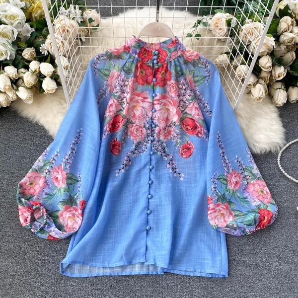 Moodne naiste komplekt pluusist ja pükstest koos vööga