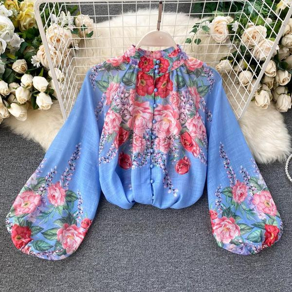 Moodne naiste komplekt pluusist ja pükstest koos vööga