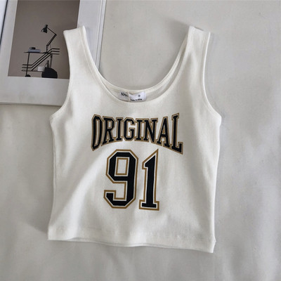 Aktuális női felső, széles pántokkal és rátéttel