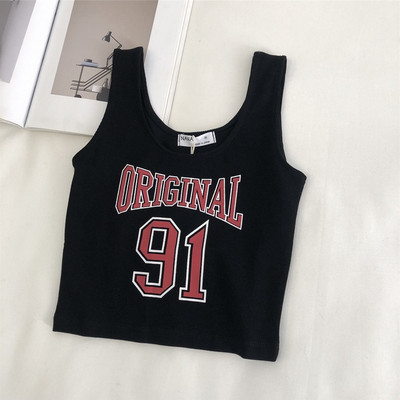 Aktuális női felső, széles pántokkal és rátéttel