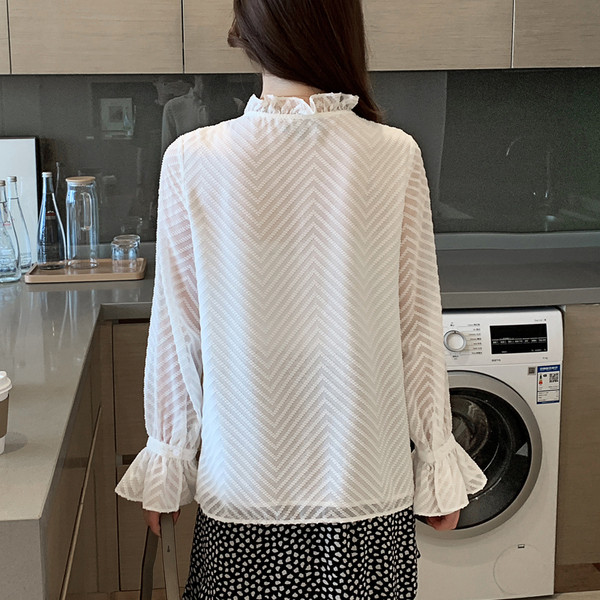 Stiilne valge paela ja pikkade varrukatega naiste särk