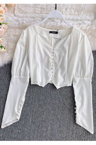 Stílusos női rövid ing gombokkal és hosszú ujjú