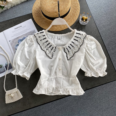 Modern női ing gyöngygombokkal