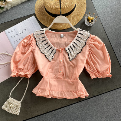 Modern női ing gyöngygombokkal