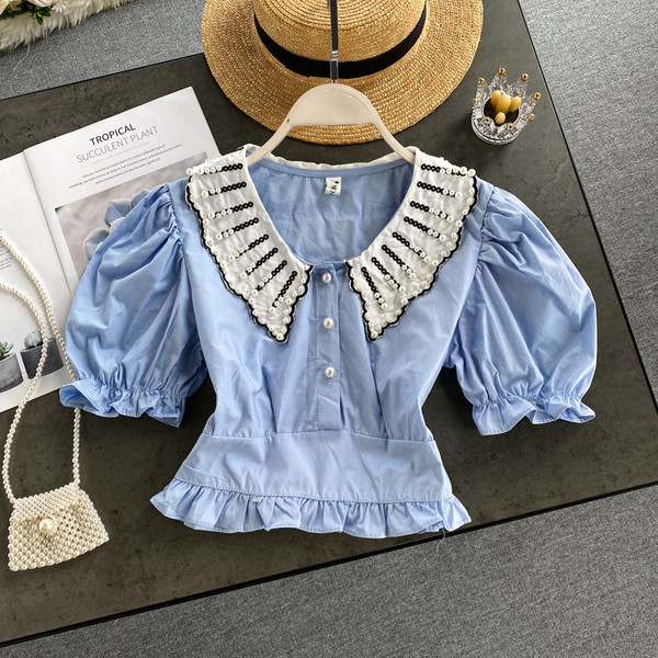 Modern női ing gyöngygombokkal